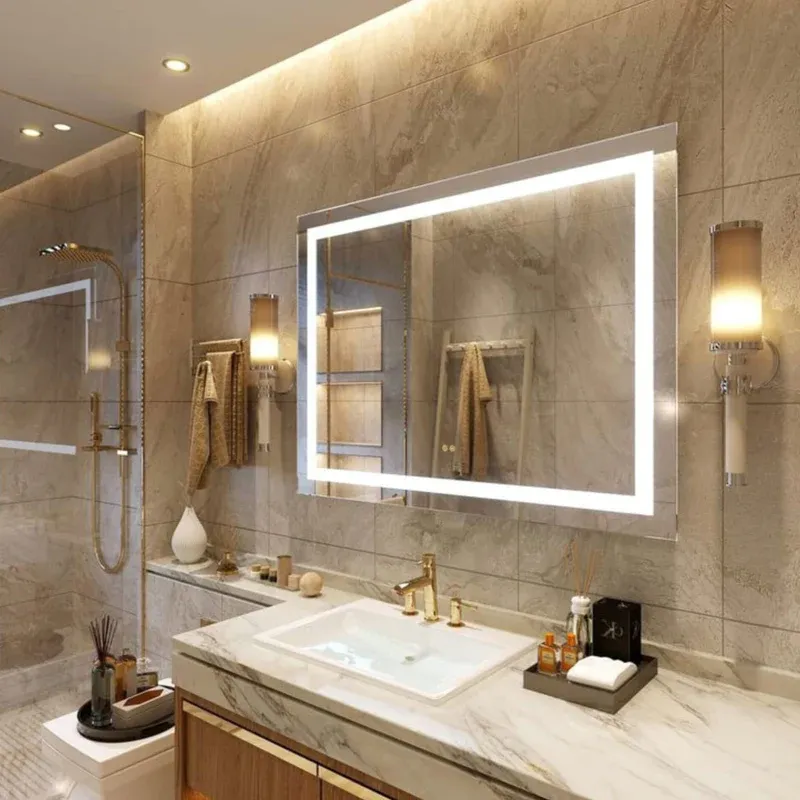 Premium custom mirrors Qatar fabrication by Al Najm Glass & Mirror Company. Luxury bathroom interior design showcasing a bespoke custom-sized LED backlit mirror with front-facing smart control illumination and precision diamond-cut bevelled wall panels for luxury homes in Doha.